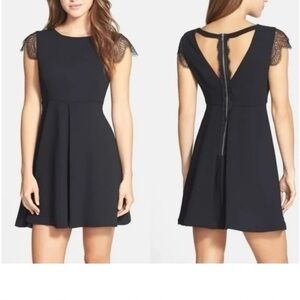 BCBGeneration Black Mini Dress with Lace Sleeves